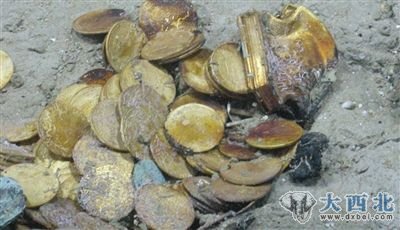 奥德赛公司在沉船上发现近60万枚金银币,价值约5亿美元。 奥德赛公司在沉船上发现近60万枚金银币,价值约5亿美元。