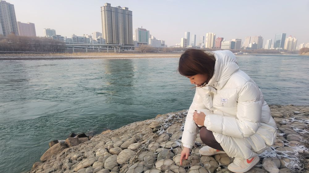 新春走基层|冬阳照河清